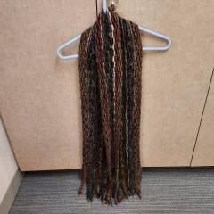 Large lightweight multi color shawl / scarf left at the Manor puzzle table.