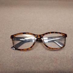 Black / brown reading glasses left at Market Place.
