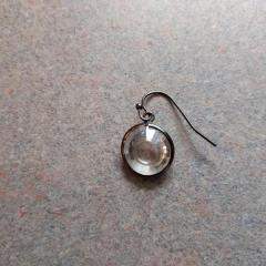 Black wire round earring with clear crystal found at Riverview.