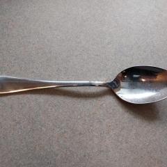 Large silver spoon left at Riverview.