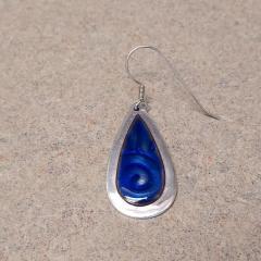 Large silver teardrop earring with navy inlay found on the Manor lower level by the recycling.
