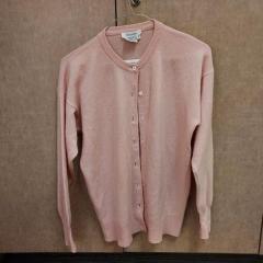 Womens pink cashmere sweater by Robinsons left at the Mart.
