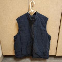 Men's XL navy blue winter vest by Banana Republic found in the Blue Heron Auditorium.