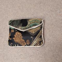 Small asian inspired pouch found outside the Manor entrance.